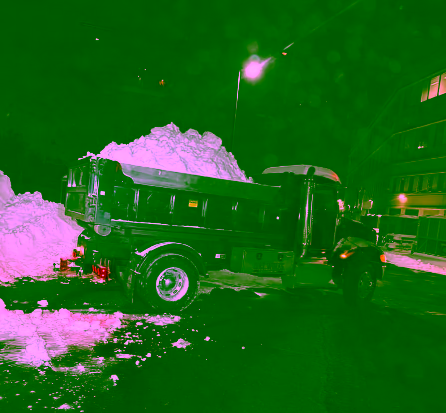Commercial snow hauling with a dump truck on a Pittsburgh property